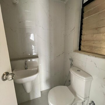 Bathroom in 1.5 BHK Apartment at Runwal Gardens Phase 2, Kalyan Shilphata Road – for Rent