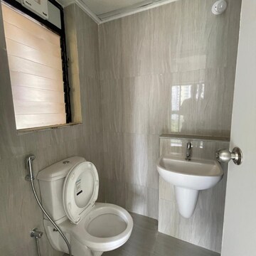 Bathroom in 1.5 BHK Apartment at Runwal Gardens Phase 2, Kalyan Shilphata Road – for Rent
