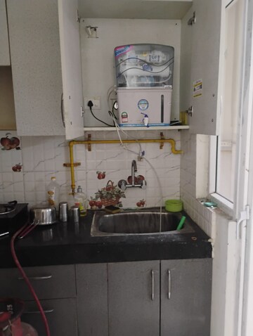 Kitchen in 2 BHK Apartment at VVIP Addresses, Raj Nagar Extension – for Sale