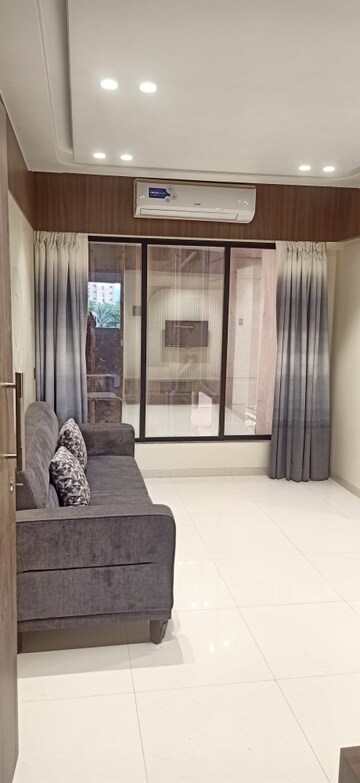 Living Room in 1 BHK Apartment at Divine Vista Harmony, Rasayani – for Sale