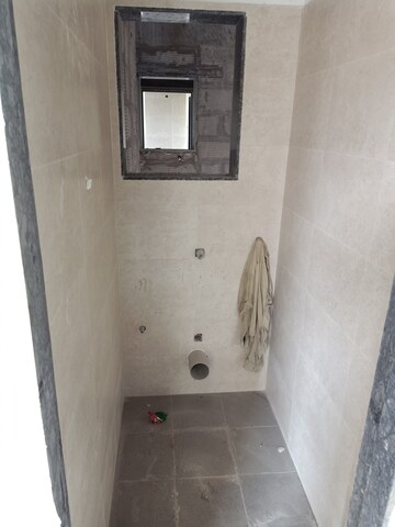 Bathroom in 1 BHK Apartment at Divine Vista Harmony, Rasayani – for Sale