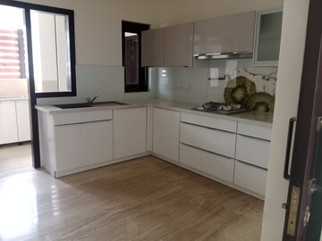 Kitchen in 4 BHK Apartment at Embassy Grove, Kodihalli – for Rent