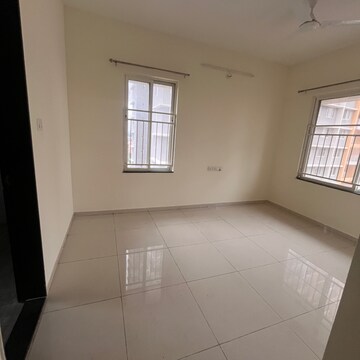 Room in 2 BHK Apartment at Kolte Patil Life Republic, Marunji – for Rent