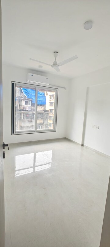 Bedroom in 2 BHK Apartment at Acharat Baug, Santacruz West – for Sale