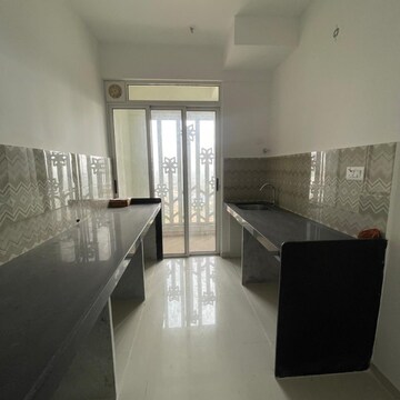 Kitchen in 2 BHK Apartment at Lodha Codename Premier, Mangaon – for Rent