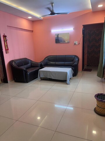 Living Room in 2 BHK Apartment at Kolte Patil Downtown Langston, Kharadi – for Rent