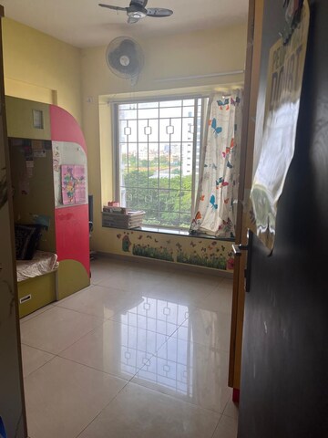 Living Room in 2 BHK Apartment at Kolte Patil Downtown Langston, Kharadi – for Rent