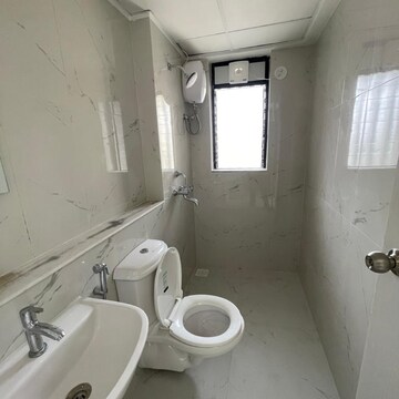 Bathroom in 1 BHK Apartment at Runwal Gardens Phase 2, Kalyan Shilphata Road – for Rent