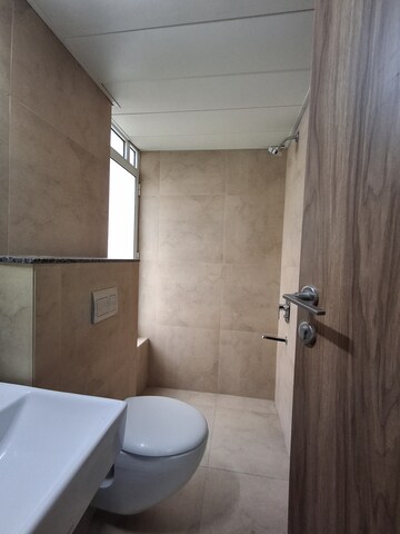 Bathroom in 1.5 BHK Apartment at Shapoorji Pallonji Siennaa, Kandivali East – for Rent