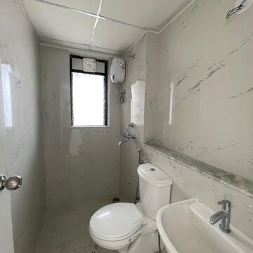 Bathroom in 2 BHK Apartment at Runwal Gardens Phase 2, Kalyan Shilphata Road – for Rent