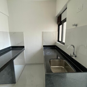 Kitchen in 2 BHK Apartment at Runwal Gardens Phase 2, Kalyan Shilphata Road – for Rent
