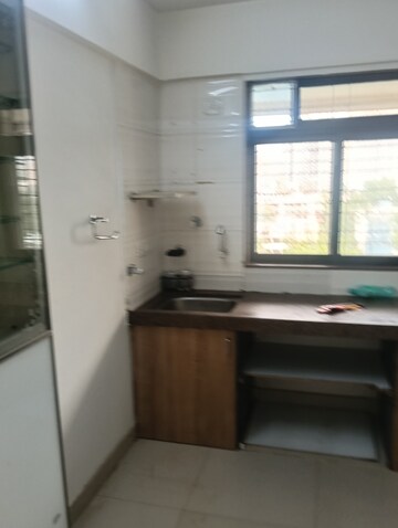Kitchen in 3 BHK Apartment at Bhatia Dahisar Sumati CHS, Dahisar West – for Rent