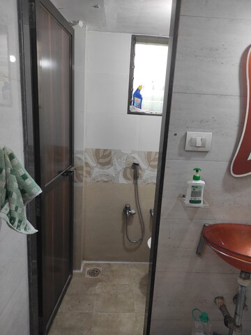 Bathroom in 1 BHK Apartment at Shree Devadiga CHS, Andheri East – for Rent