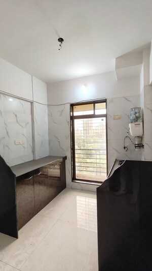Kitchen in 1 BHK Apartment at Mahadev Tower, Mira Road – for Sale
