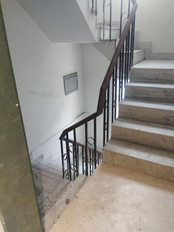Staircase in 4 BHK Builder Floor at Kailash Colony – for Sale
