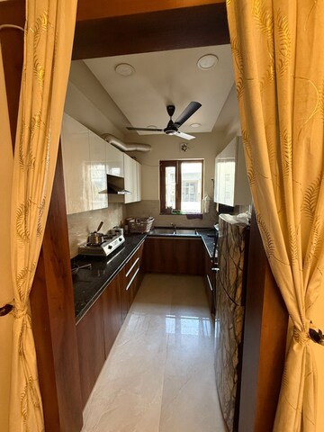 Kitchen in 2 BHK Builder Floor at RPS Palm Drive, Sector 88 – for Rent