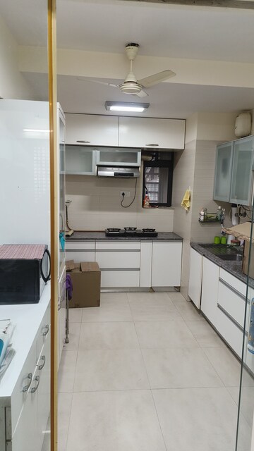 Kitchen in 2.5 BHK Apartment at Lokhandwala Sapphire Heights, Kandivali East – for Sale