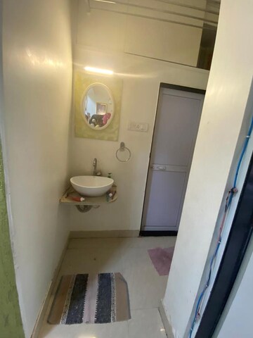 Bathroom in 2 BHK Apartment at Mira Niwas, Khar West – for Sale