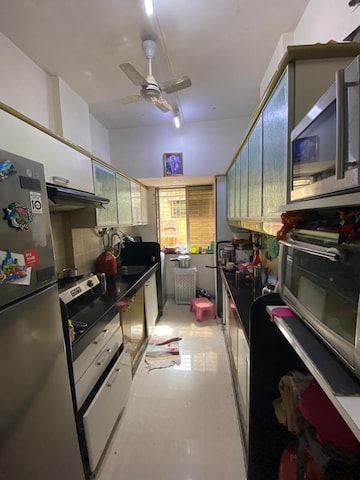 Kitchen in 2 BHK Apartment at Mira Niwas, Khar West – for Sale