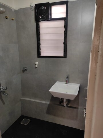 Bathroom in 3 BHK Apartment at Border Roads CHS Phase 1, Dhanori – for Rent