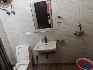 Bathroom in 3 BHK Apartment at Indrapuram – for Rent