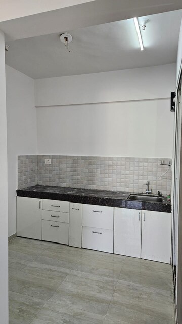 Kitchen in 2 BHK Apartment at Mittal High Mont, Hinjewadi – for Rent