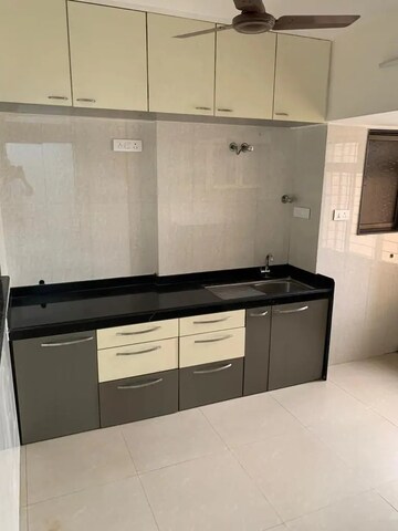 Kitchen in 3 BHK Apartment at Prarthna Heights, Parel – for Rent