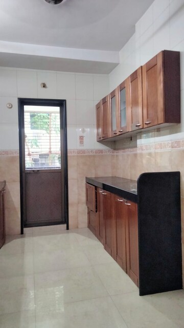 Kitchen in 2.5 BHK Apartment at Radha Govind, Borivali East – for Rent