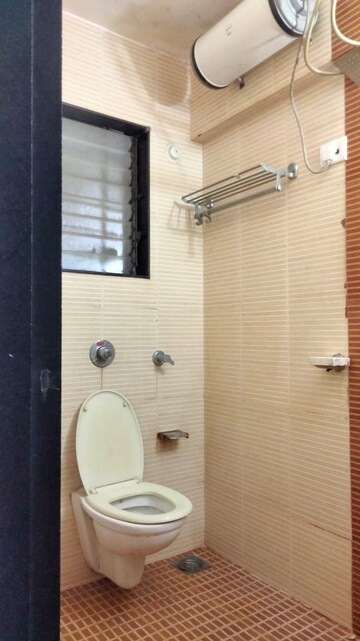 Bathroom in 2.5 BHK Apartment at Radha Govind, Borivali East – for Rent