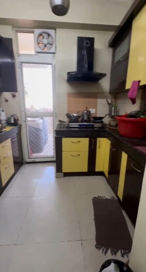 Kitchen in 2 BHK Apartment at Ajnara Gen X, Dundahera – for Sale