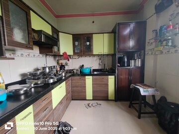 Kitchen in 2.5 BHK Apartment at Govind Dham Chs, Kalwa – for Sale
