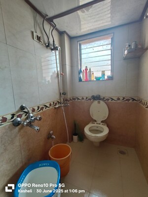 Bathroom in 2.5 BHK Apartment at Govind Dham Chs, Kalwa – for Sale