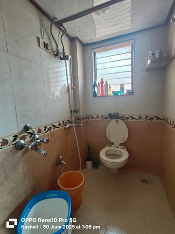 Bathroom in 2.5 BHK Apartment at Govind Dham Chs, Kalwa – for Sale