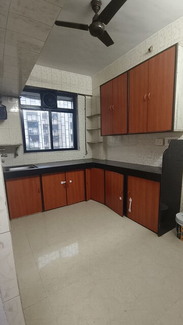 Kitchen in 1 BHK Apartment at Shiv Shakti Apartments Malad, Malad West – for Rent