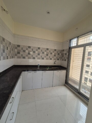 Kitchen in 2 BHK Apartment at Gurukrupa Tulsi Heights, Ulwe Sector 8 – for Rent
