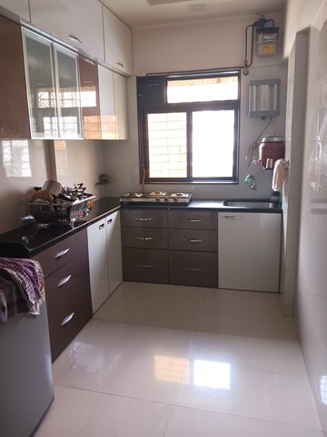 Kitchen in 2 BHK Apartment at Ganesh Krupa Apartments	, Borivali West – for Sale