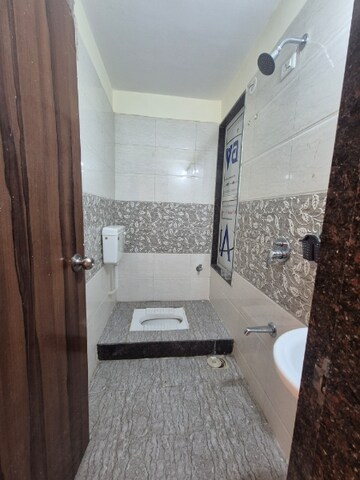 Bathroom in 2 BHK Apartment at Gurukrupa Tulsi Heights, Ulwe Sector 8 – for Rent