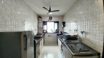 Kitchen in 3 BHK Apartment at Kunti Park, Marol – for Sale