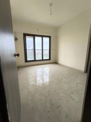 Room in 4 BHK Apartment at Abrol Avirahi Heights, Malad West – for Sale