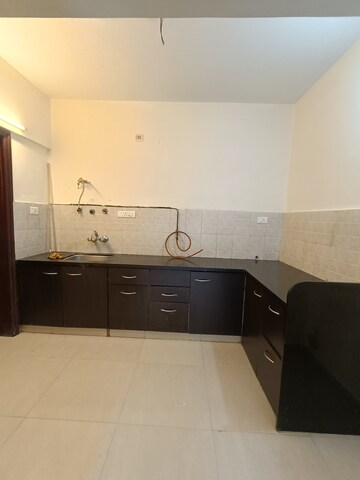 Kitchen in 2 BHK Apartment at Bramha Suncity, Wadgaon Sheri – for Rent