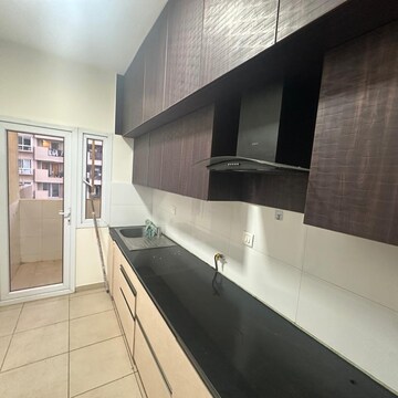 Kitchen in 2 BHK Apartment at Bhartiya City, Kannur – for Sale