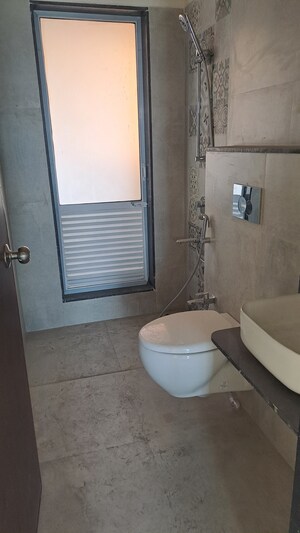 Bathroom in 1 BHK Apartment at DSS Mahavir Kalpavruksha Alcacia Tower, Ghodbunder Road – for Sale