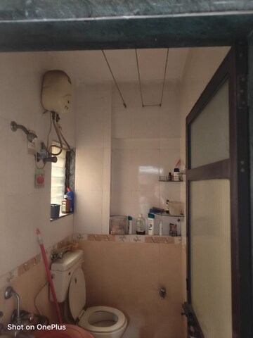 Bathroom in 2 BHK Apartment at Yashraaj Park, Ghodbunder Road – for Rent