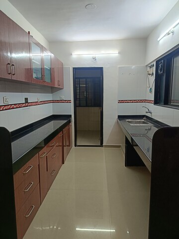 Kitchen in 2 BHK Apartment at Eden Garden CHS, Viman Nagar – for Rent