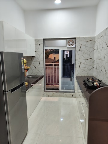 Kitchen in 1 BHK Apartment at Laxmi Saptashrungi Heights, Nalasopara West – for Sale