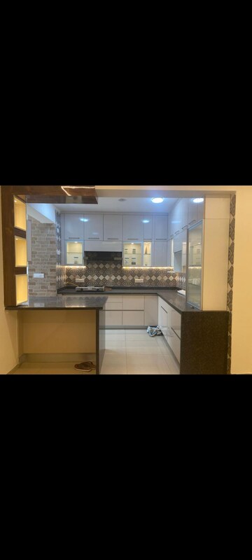 Kitchen in 3 BHK Apartment at Gulshan Bellina, Sector 16 Greater Noida – for Rent