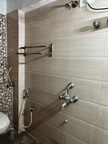 Bathroom in 2 BHK Apartment at Royal Palms Garden View, Goregaon East – for Rent