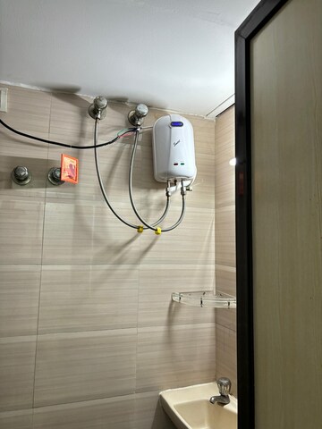 Bathroom in 2 BHK Apartment at Royal Palms Garden View, Goregaon East – for Rent