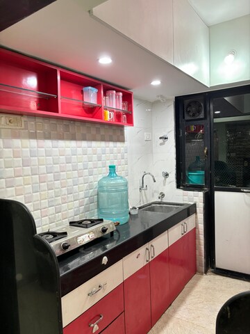 Kitchen in 2 BHK Apartment at Royal Palms Garden View, Goregaon East – for Rent