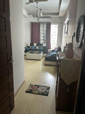 Living Room in 2.5 BHK Apartment at Mahagun Moderne, Sector 78 – for Rent